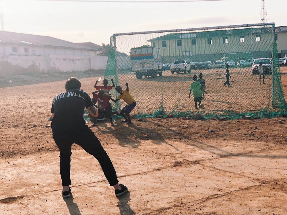 Kids playing soccer on the cliffs by Calabash.